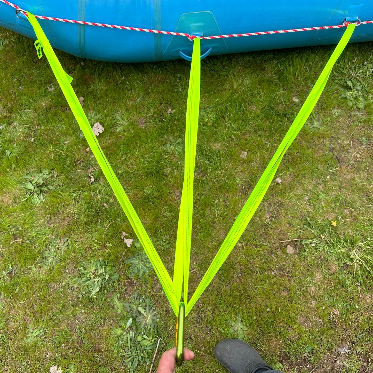 Self-equalizing anchor on a raft with tubular webbing